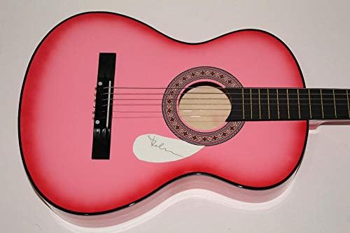 Madonna je potpisala autogram ružičasta akustična gitara - poput molitve, erotike, seksi
